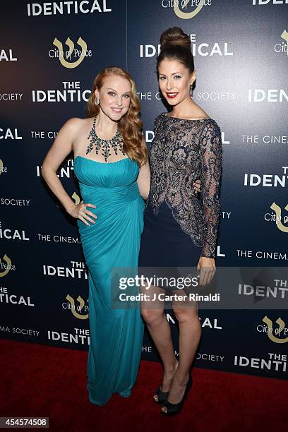 Actresses Erin Cottrell and Amanda Crew attend the City Of Peace Films with The Cinema Society host the premiere of 'The Identical' at SVA Theater on...