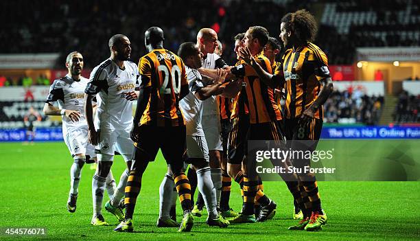 Swansea player Jonjo Shelvey gets involved in some handbags during the Barclays Premier league match between Swansea City and Hull City at the...