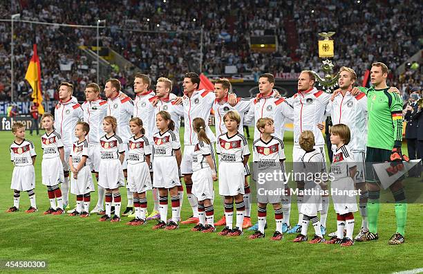 September 03: The team of Germany lines up prior to the international friendly match between Germany and Argentina at Esprit-Arena on September 3,...