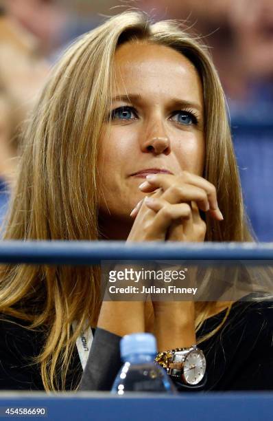 Kim Sears watches her boyfriend Andy Murray of Great Britain play against Novak Djokovic of Serbia in their men's singles quarterfinal match on Day...