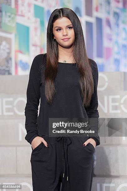 Selena Gomez poses for photos near the runway at Adidas Neo during Mercedes-Benz Fashion Week Spring 2015 at The Waterfront on September 3, 2014 in...