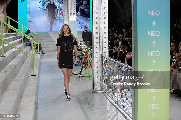 Model walks the runway at Adidas Neo during Mercedes-Benz Fashion Week Spring 2015 at The Waterfront on September 3, 2014 in New York City.