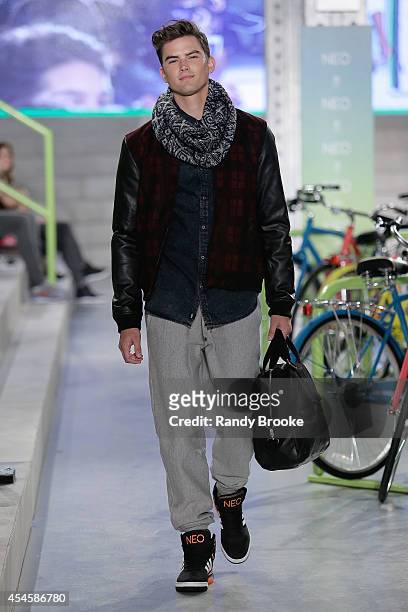 Model walks the runway at Adidas Neo during Mercedes-Benz Fashion Week Spring 2015 at The Waterfront on September 3, 2014 in New York City.