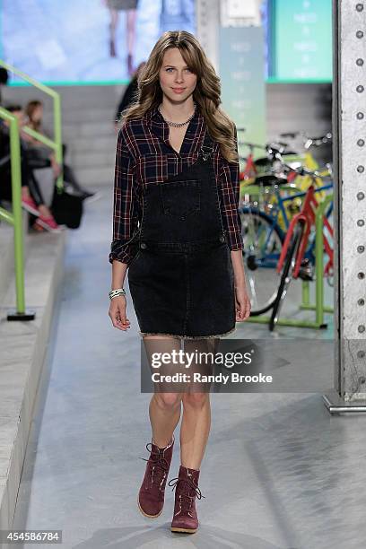 Model walks the runway at Adidas Neo during Mercedes-Benz Fashion Week Spring 2015 at The Waterfront on September 3, 2014 in New York City.