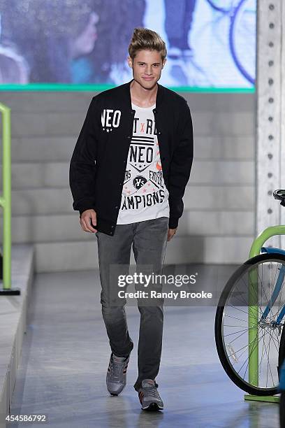 Model walks the runway at Adidas Neo during Mercedes-Benz Fashion Week Spring 2015 at The Waterfront on September 3, 2014 in New York City.