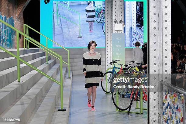 Model walks the runway at Adidas Neo during Mercedes-Benz Fashion Week Spring 2015 at The Waterfront on September 3, 2014 in New York City.