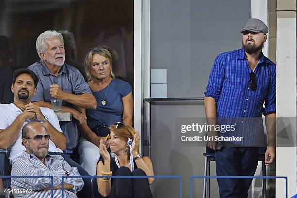 Leonardo DiCaprio and his mother Irmelin Indenbirken, Bobby Zarin and Jill Zarin attend day 10 of the 2014 US Open at USTA Billie Jean King National...