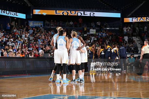 Allie Quigley, Tamera Young and members of the Chicago Sky huddle up during game two of the WNBA Eastern Conference Finals against the Indiana Fever...