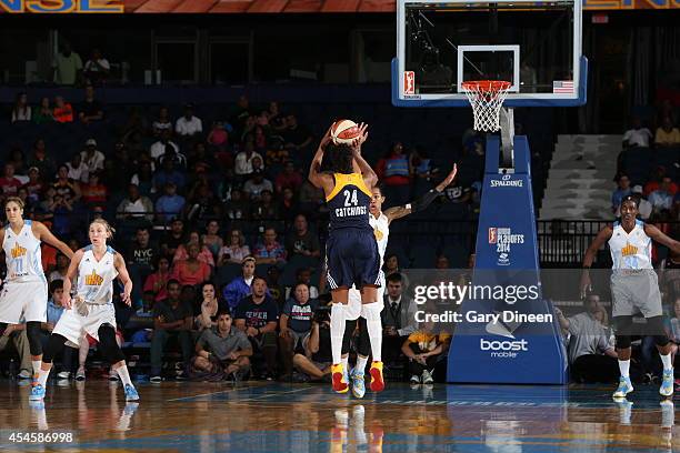 Tamika Catchings of the Indiana Fever shoots the ball during game two of the WNBA Eastern Conference Finals against the Chicago Sky as part of the...