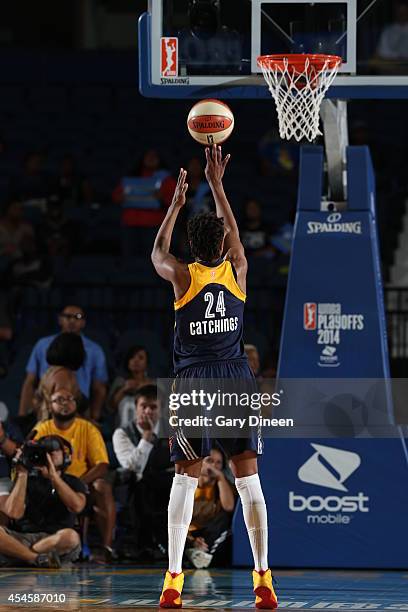 Tamika Catchings of the Indiana Fever shoots a free throw during game two of the WNBA Eastern Conference Finals against the Chicago Sky as part of...