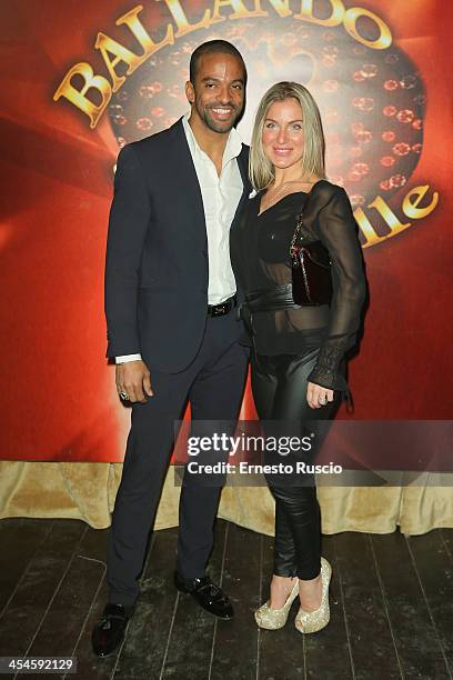 Maykel Fonts and Caterina attend the "Ballando con le stelle" 100th Episode Party at La Villa on December 9, 2013 in Rome, Italy.