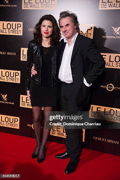 Jean-Christophe Grange and friend attend 'The Wolf of Wall Street' photocall at Palais Brogniart on December 9, 2013 in Paris, France.