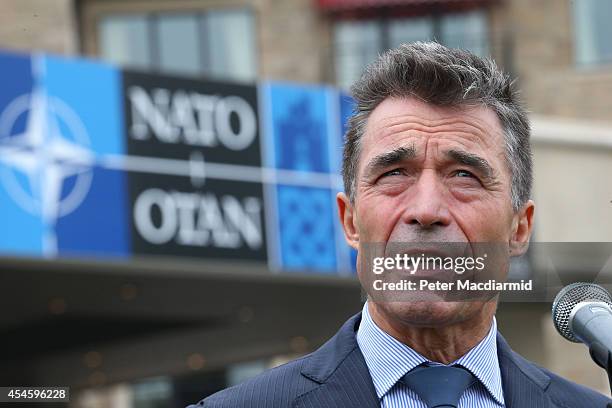 Secretary General Anders Fogh Rasmussen talks to reporters at the NATO Summit on September 4, 2014 in Newport, Wales. Leaders and senior ministers...