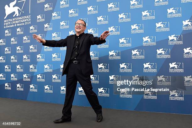 Director Wang Xiaoshuai attends the 'Red Amnesia' photocall during the 71st Venice Film Festival on September 4, 2014 in Venice, Italy.