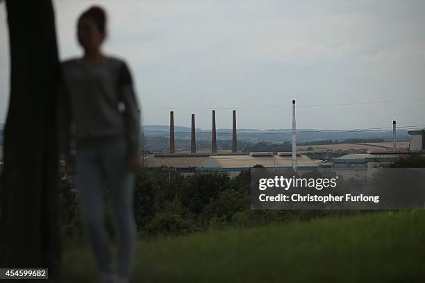 Teenage girl, who claims to be a victim of sexual abuse and alleged grooming, poses in Rotherham on September 3, 2014 in Rotherham, England. South...