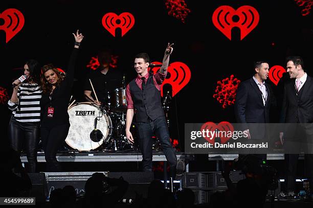 Radio personalities Angi Taylor, Nina Chantele, ErikZ, Jordan, and Brady speak onstage during 103.5 KISS FMs Jingle Ball 2013, presented by Jam...