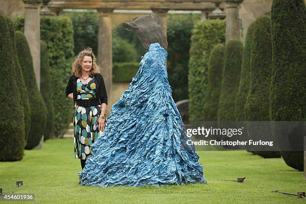 Artist Lori Park poses next to her work Silk Weaver which adorns the grounds of Chatsworth House which is part of the annual Sotheby's monumental...