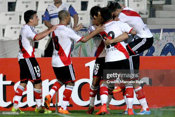 German Pezzella of River Plate celebrates with teammates after scoring the opening goal during a first leg match between Godoy Cruz and River Plate...