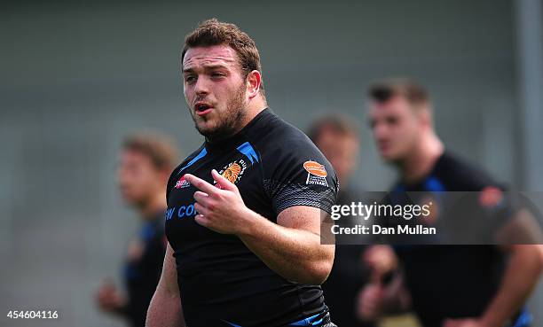 Greg Bateman of Exeter Chiefs looks on during a training session ahead of the opening game of the Aviva Premiership 2014/15 Season at Sandy Park on...