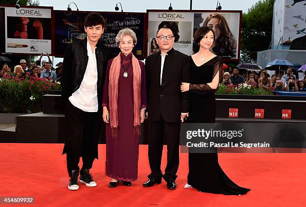 Actors Qin Hao, Lu Zhong and director Wang Xiaoshuai attend 'Red Amnesia' Premiere during the 71st Venice Film Festival on September 4, 2014 in...