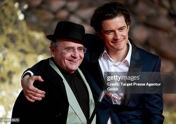 Sylvester McCoy and Orlando Bloom attend the German premiere of the film 'The Hobbit: The Desolation Of Smaug' at Sony Centre on December 9, 2013 in...