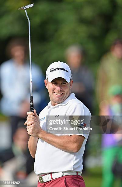 Richie Ramsay of Scotland reacst to a putt during the first round of the Omega European Masters at Crans-sur-Sierre Golf Club on September 4, 2014 in...