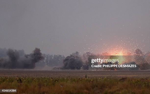 View of the outskirts of Mariupol on September 4, 2014 under pro-Russian separatists heavy artillery action. Strong explosions rocked the outskirts...