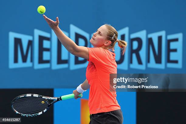 Jelena Dokic of Australia serves in her first round match against Jarmila Gajdosova of Australia in the Australian Open 2014 Qualifying at Melbourne...