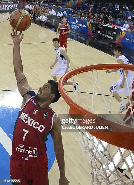 Mexico's guard Jorge Gutierrez jumps for the ball during the 2014 FIBA World basketball championships group D match Korea vs Mexico at the Gran...