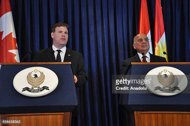 Canadian Foreign Affairs Minister John Baird and Chief of Staff for Kurdish Regional Government Fuad Hussein attend a press conference following...