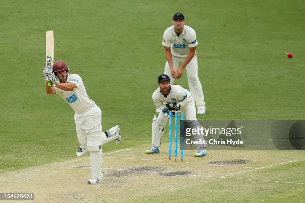 Joe Burns of the Bulls bats during day three of the Sheffield Shield match between the Queensland Bulls and the Victoria Bushrangers at The Gabba on...