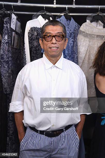 Designer Tadashi Shoji poses backstage at Tadashi Shoji during Mercedes-Benz Fashion Week Spring 2015 at The Salon at Lincoln Center on September 4,...