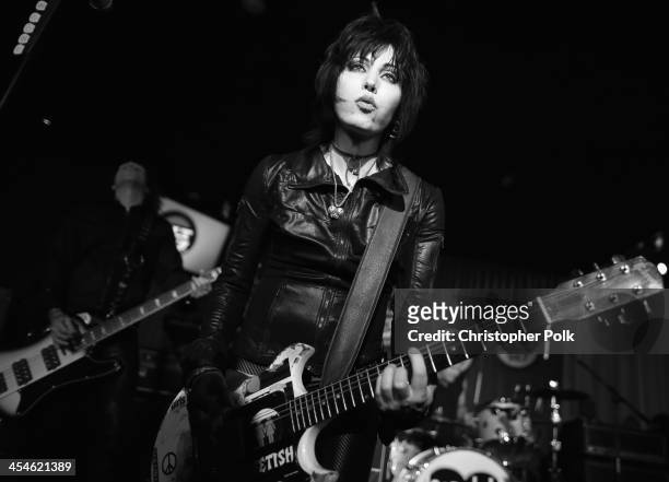 Musician Joan Jett performs at The ALTimate Rooftop Christmas Party at W Hollywood on December 9, 2013 in Hollywood, California.