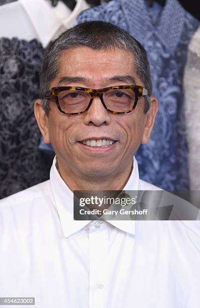 Designer Tadashi Shoji poses backstage at Tadashi Shoji during Mercedes-Benz Fashion Week Spring 2015 at The Salon at Lincoln Center on September 4,...