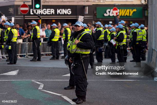 Police keep watch near Cardiff Castle during the NATO Summit on September 4, 2014 which is being held in Newport, Wales. Leaders and senior ministers...