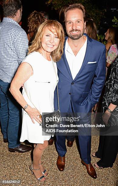Lulu and Alfie Boe attend the Woodside End of Summer party to benefit the Elton John AIDS Foundation sponsored by Chopard and Grey Goose at Woodside...