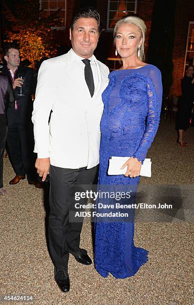 Giorgio Veroni and Tamara Beckwith attend the Woodside End of Summer party to benefit the Elton John AIDS Foundation sponsored by Chopard and Grey...