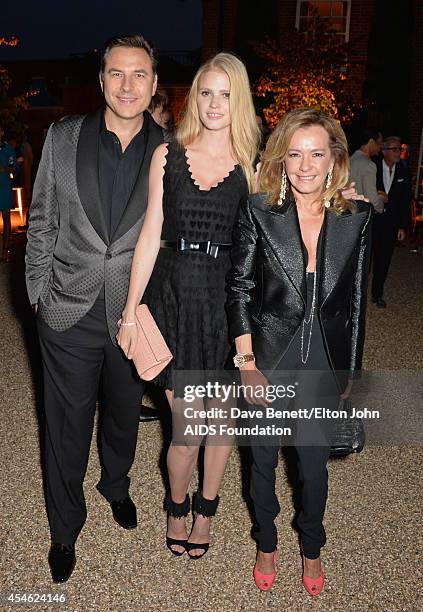 David Walliams, Lara Stone and Caroline Scheufele attend the Woodside End of Summer party to benefit the Elton John AIDS Foundation sponsored by...