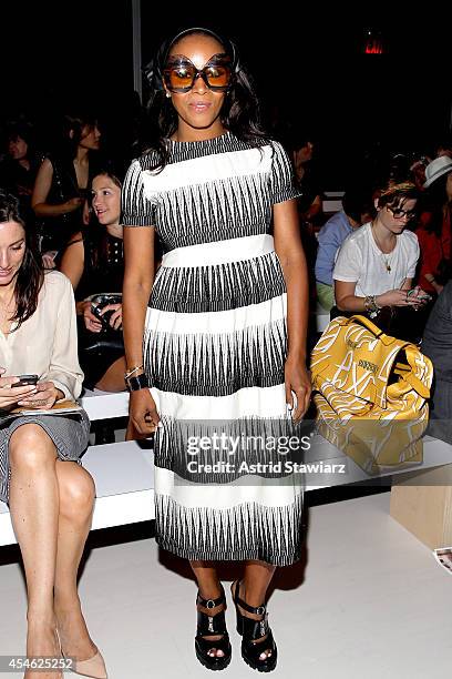 Blogger June Ambrose attends the Tadashi Shoji fashion show during Mercedes-Benz Fashion Week Spring 2015 at The Salon at Lincoln Center on September...