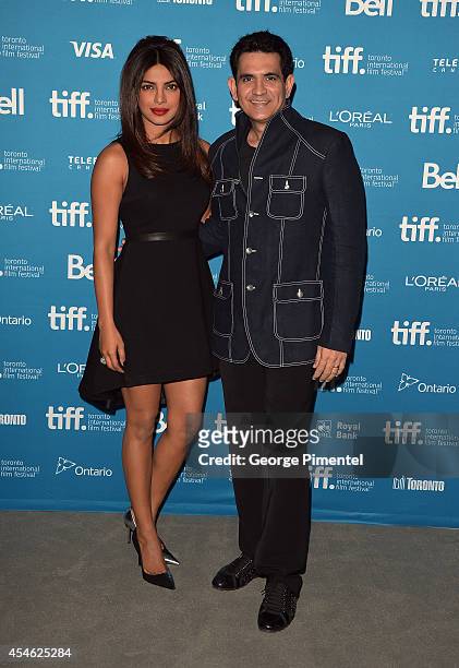 Actress Priyanka Chopra and Omung Kumar attend the"Mary Kom" Press Conference during the 2014 Toronto International Film Festival at TIFF Bell...