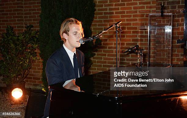 Tom Odell performs at the Woodside End of Summer party to benefit the Elton John AIDS Foundation sponsored by Chopard and Grey Goose at Woodside on...