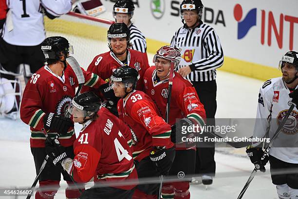 Andreas Johnson of Frolunda celebrates with team-mates after scoring the opening during the Champions Hockey League group stage game between Frolunda...