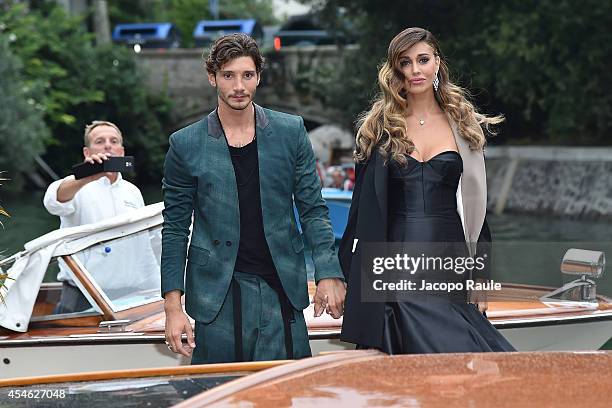 Belen Rodriguez and Stefano De Martino are seen during The 71st Venice International Film Festival on September 4, 2014 in Venice, Italy.