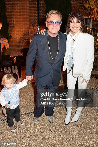 Elijah Furnish-John, Sir Elton John and Chrissie Hynde attend the Woodside End of Summer party to benefit the Elton John AIDS Foundation sponsored by...
