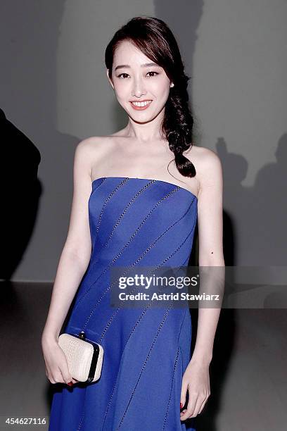 Actress Jiang Mengjie attends the Tadashi Shoji fashion show during Mercedes-Benz Fashion Week Spring 2015 at The Salon at Lincoln Center on...