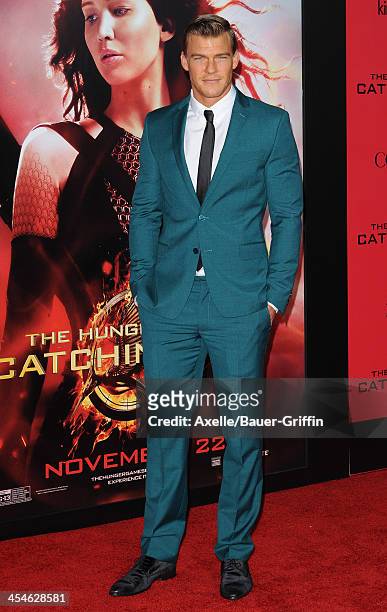 Actor Alan Ritchson arrives at the Los Angeles Premiere of 'The Hunger Games: Catching Fire' at Nokia Theatre L.A. Live on November 18, 2013 in Los...