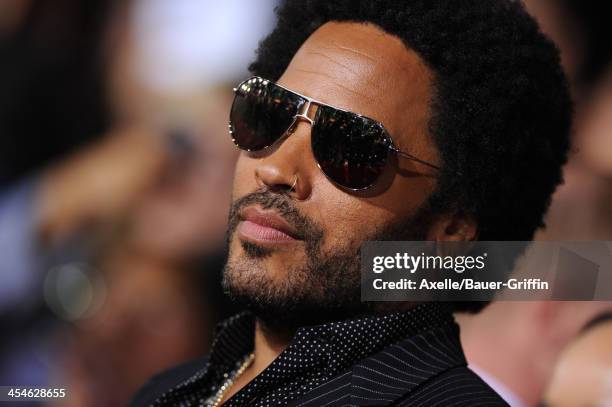 Musician Lenny Kravitz arrives at the Los Angeles Premiere of 'The Hunger Games: Catching Fire' at Nokia Theatre L.A. Live on November 18, 2013 in...