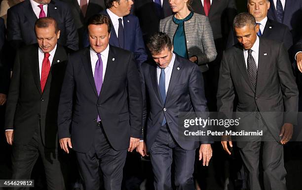 Turkish President Recep Tayyip Erdogan, British Prime Minister David Cameron, NATO Secretary General Anders Fogh Rasmussen and US President Barack...