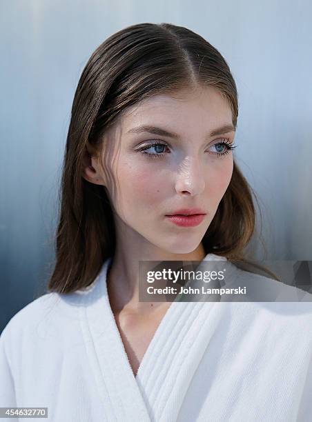 Model Anastasia Lagune prepares backstage during the Costello Tagliapietra during MADE Fashion Week Spring 2015 at Milk Studios on September 4, 2014...