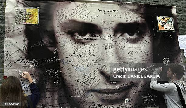Fans pay tribute to Argentine musician Gustavo Cerati in front of the clinic where he died from a stroke on September 4, 2014 in Buenos Aires . On...